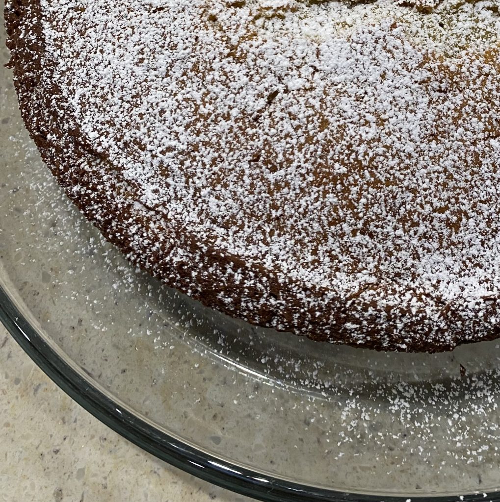 the orange ricotta cake dusted with powdered sugar
