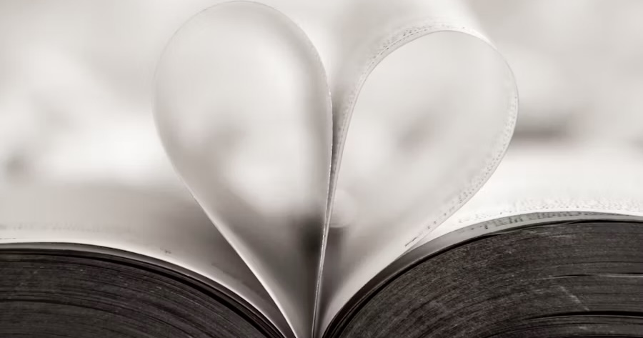 pages of a book folded to make a heart