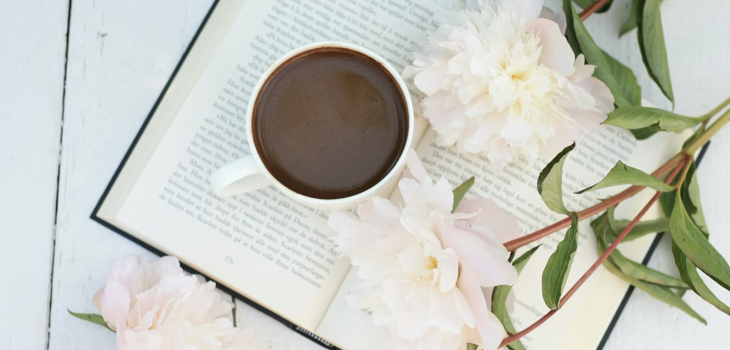 flowers, coffee, book